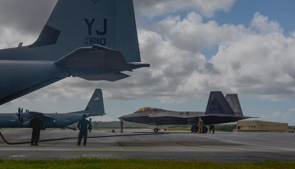 Air Force F-22 C-130J hot refueling Guam