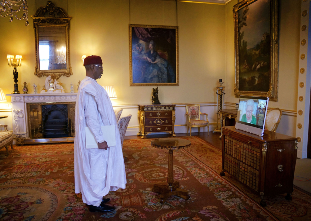 Britain's Queen Elizabeth II video chatting from Windsor Castle with Chad's ambassador to the United Kingdom, Kedella Younous Hamidi, in 2022.