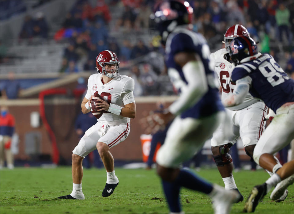 Alabama QB Mac Jones, left, had another strong game against Ole Miss. (Photo by Kent Gidley/Collegiate Images/Getty Images)