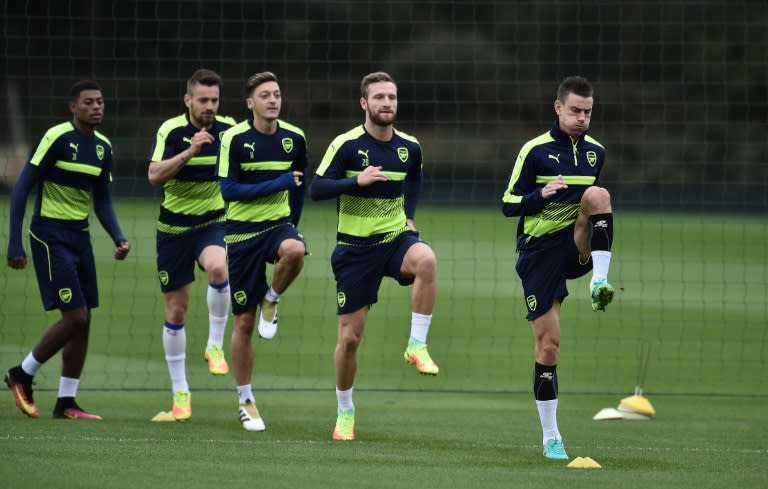 Arsenal's Shkodran Mustafi (2nd R) has formed a formidable central defensive partnership with Laurent Koscielny (R), resolving one of the Gunners' weak points