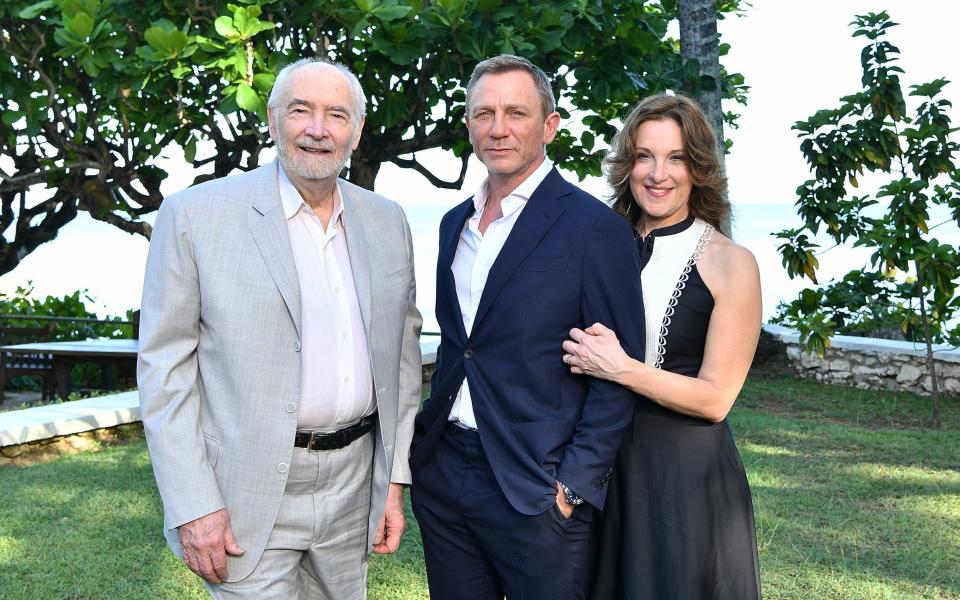 Producers Michael G Wilson (left) and Barbara Broccoli (right) with Daniel Craig (centre) at Ian Fleming's GoldenEye home