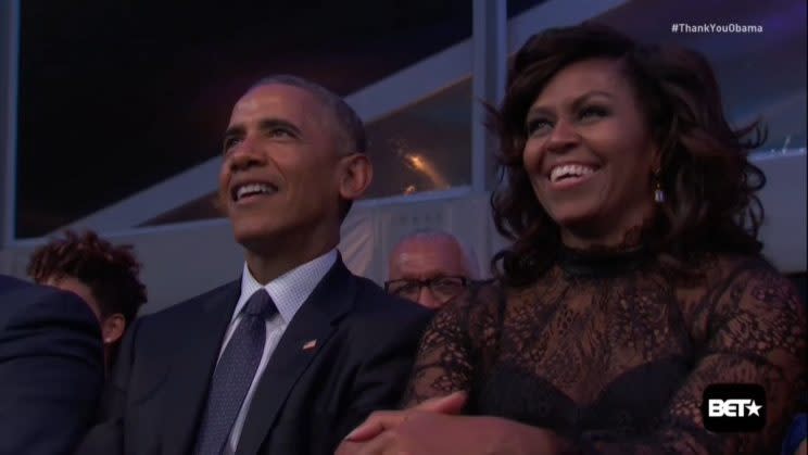 Barack and Michelle Obama taking in BET's 