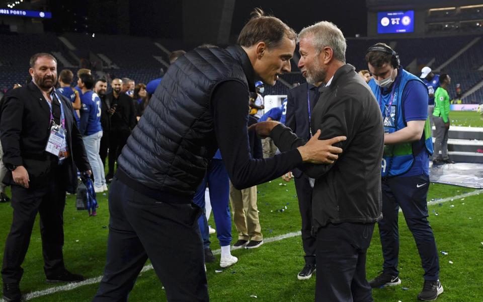 Roman Abramovich (right) joins the Chelsea celebrations on the pitch - GETTY IMAGES