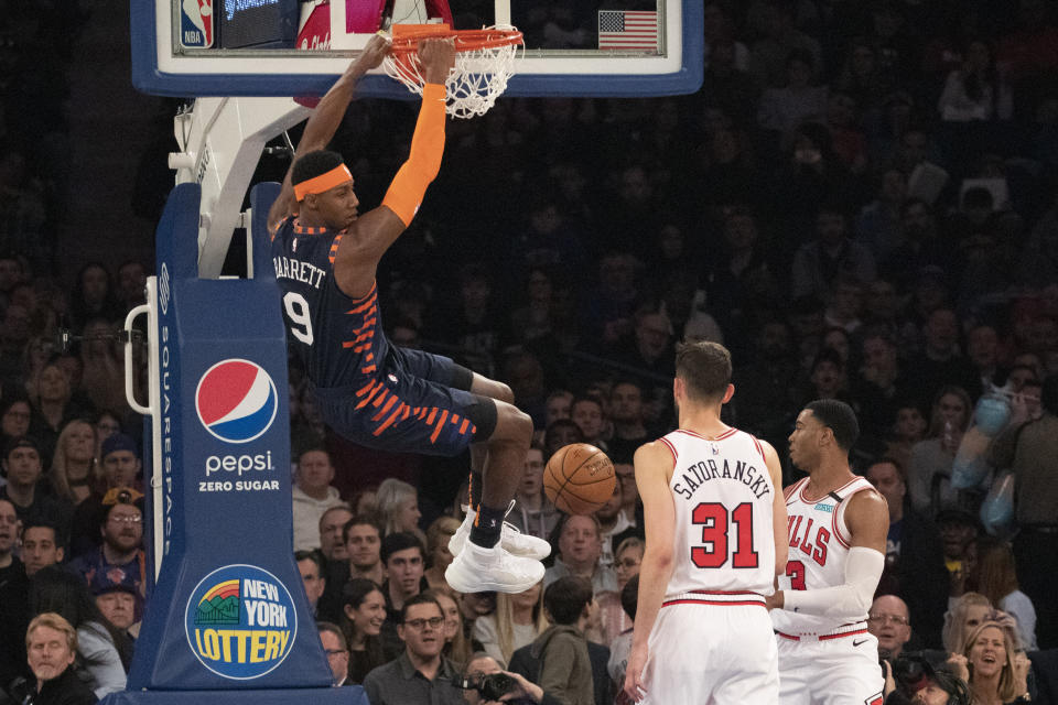 New York Knicks guard RJ Barrett (9) dunks over Chicago Bulls guard Tomas Satoransky (31) during the first half of an NBA basketball game, Saturday, Feb. 29, 2020 in New York. (AP Photo/Mark Lennihan)