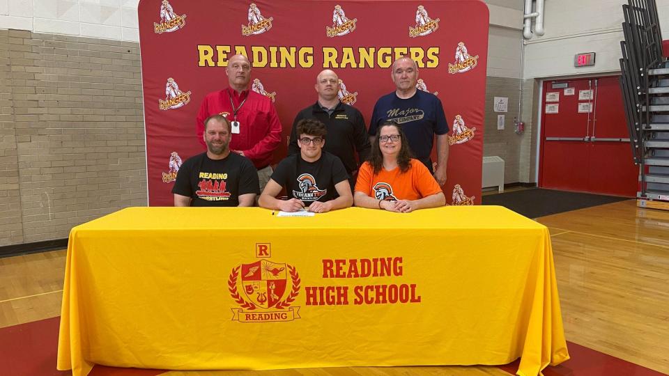 Lukas Selph signs his letter of intent to join the Indian Tech wrestling team. He was joined by his parents, Lisa and Jason Selph, and coaches, including Mark Draper and Jack Hassenzahl.
