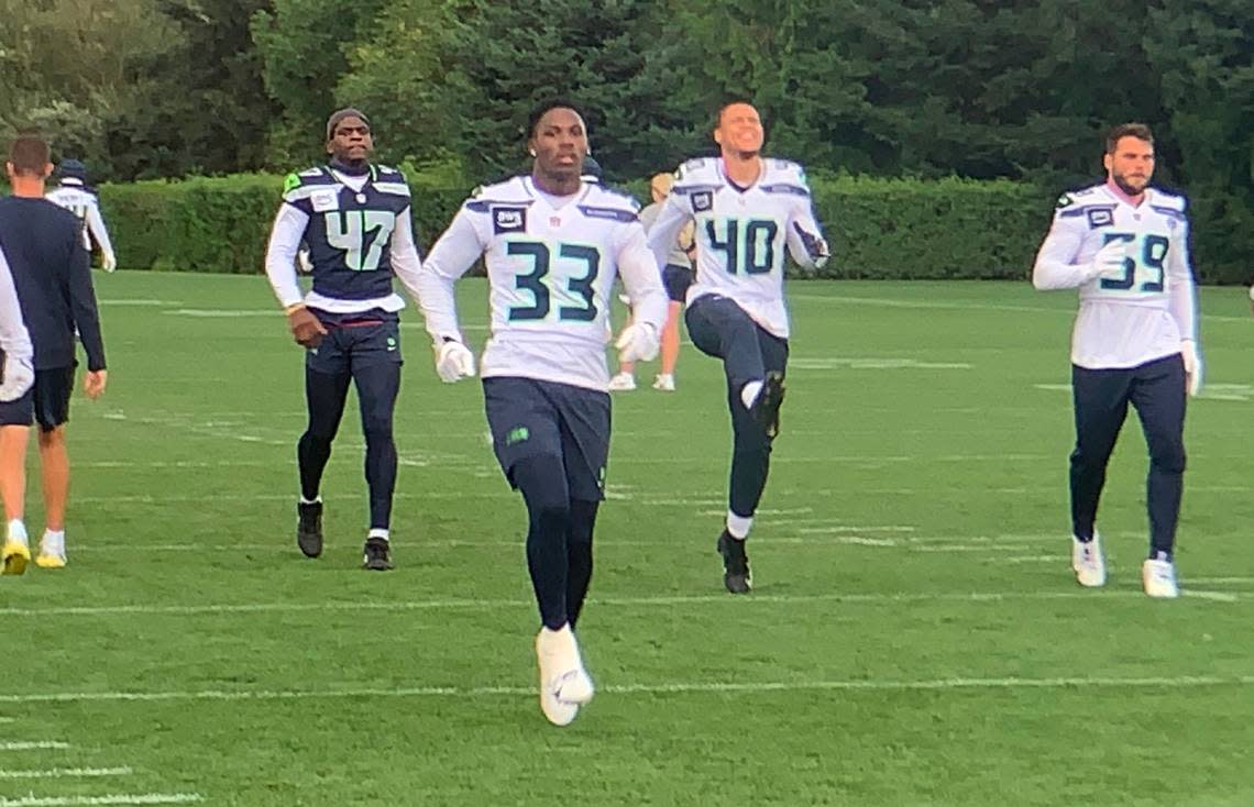 Cornerback and kick returner Dee Williams (33), a rookie free agent from the University of Tennessee, warms up for the 19th practice of Seahawks training camp at the Virginia Mason Athletic Center in Renton, Aug. 21, 2024. Gregg Bell/The News Tribune