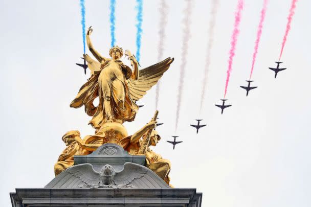 PHOTO: The Royal Air Force Aerobatic Team otherwise known as The Red Arrows fly over The Queen Victoria Memorial during the Coronation of King Charles III and Queen Camilla, May 06, 2023 in London. (Dan Mullan/Getty Images)