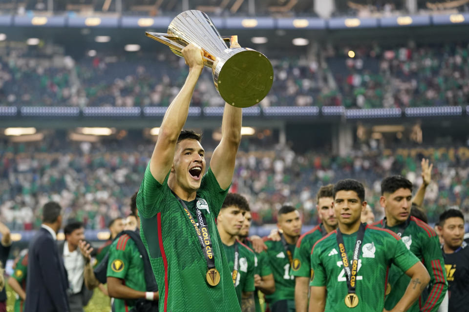 Mexico's Cesar Montes lift the winner's trophy after beating Panama 1-0 in the CONCACAF Gold Cup final soccer match Sunday, July 16, 2023, in Inglewood, Calif. (AP Photo/Ashley Landis)