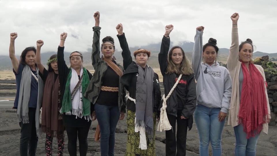 Pua Case (fifth from left) helped organize the Mauna Kea movement, where thousands protested the installation of a telescope on a dormant and sacred volcano in Hawaii.