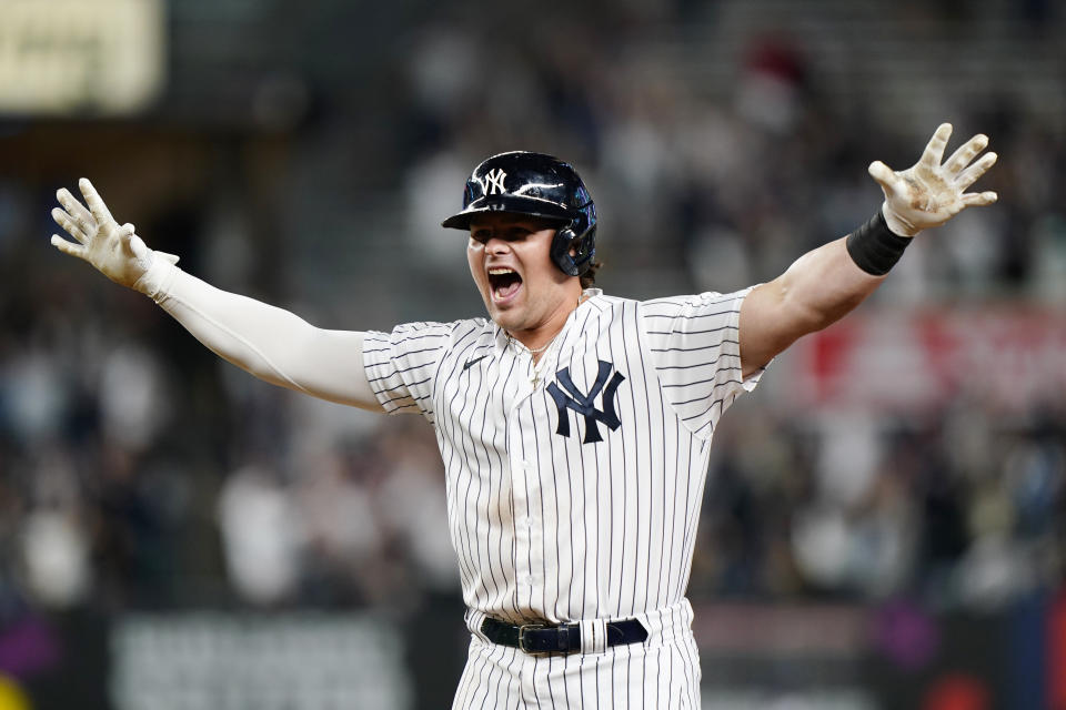 New York Yankees Luke Voit celebrates after hitting a game-winning, RBI single in the bottom fo the ninth allowing Tyler Wade to score in the Yankees 6-5 victory over the Kansas City Royals in a baseball game, Wednesday, June 23, 2021, at Yankee Stadium in New York. (AP Photo/Kathy Willens)