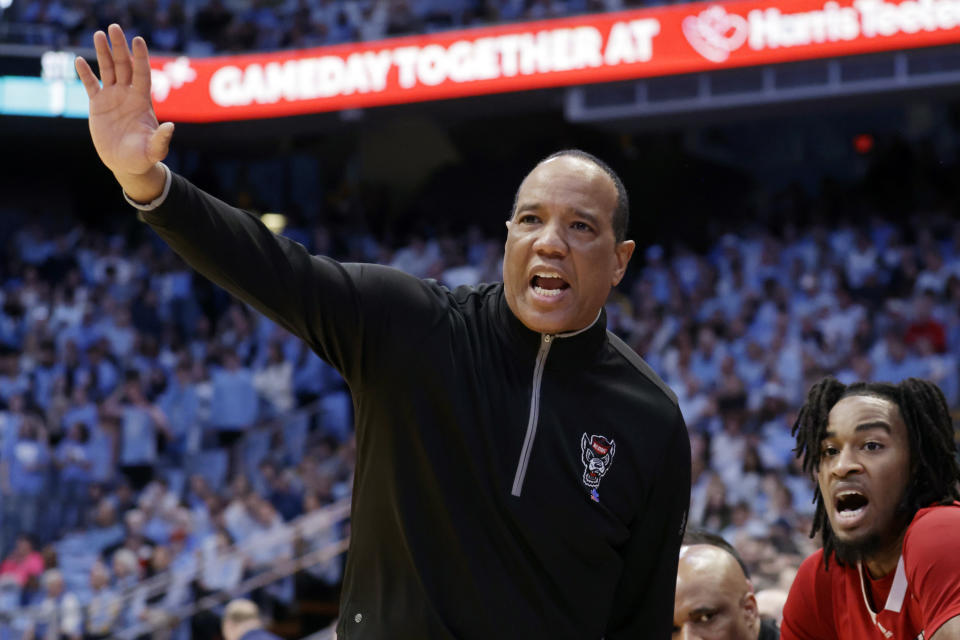 FILE - North Carolina State head coach Kevin Keatts directs the team during the first half of an NCAA college basketball game against North Carolina, Saturday, March 2, 2024, in Chapel Hill, N.C. Black coaches in the top six men's college basketball leagues are still facing a tough climb in going from assistant to the head job. “You just need opportunities,” said Keatts, who has led this year's Wolfpack to the program's first Final Four since 1983. (AP Photo/Chris Seward, File)