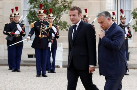 French President Emmanuel Macron meets with Hungarian Prime Minister Viktor Orban at the Elysee Palace in Paris