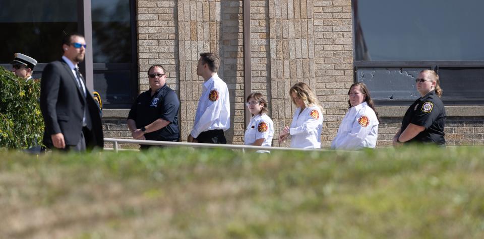 Funeral attendees make their way into Cabot United Methodist Church in Winfield Township Friday, July 19th for the funeral of Corey Comperatore the Buffalo Township man killed at SaturdayÕs rally for former President Donald Trump from a would-be assigns stray bullet. Kevin Whitlock / Massillon Independent