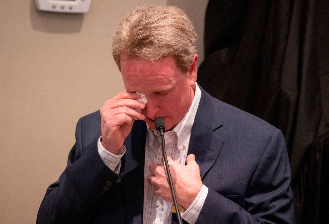 John Marvin Murdaugh, younger brother of Alex Murdaugh, wipes a tear while giving his testimony by defense attorney Jim Griffin during the Alex Murdaugh double murder trial at the Colleton County Courthouse in Walterboro on Day 25 of Monday, Feb. 27, 2023. Andrew J. Whitaker/The Post and Courier/Pool