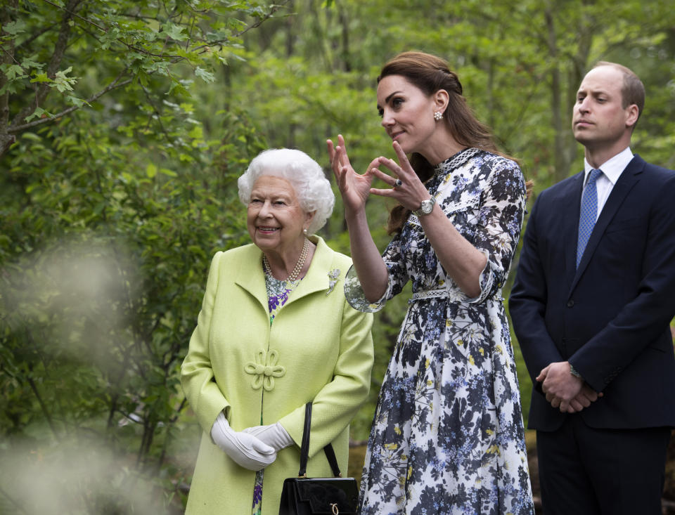 RHS Chelsea Flower Show Queen Elizabeth II, Prince William and Kate, Duchess of Cambridge observe the garden.