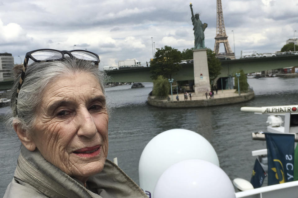 This 2019 photo provided by Olga Weiss shows her in France. For Weiss, the order to stay at home is about much more than simply locking her door to the coronavirus. It has awakened fears from decades ago when she and her parents hid inside for two years from Nazis hunting down Jews in Belgium. (Olga Weiss via AP)
