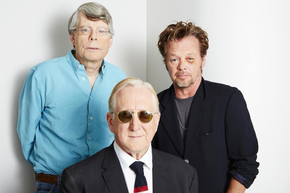 This June 3, 2013 photo shows, from left, Stephen King, T Bone Burnett and John Mellencamp posing for a portrait in New York. The trio are collaborating on a musical, "Ghost Brothers of Darkland County." A traveling production will begin later this year. (Photo by Dan Hallman/Invision/AP)