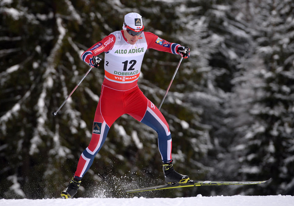 Winner Ola Vigen Hattestad of Norway skis during a cross country men's World Cup sprint, in Dobbiaco, Italy, Sunday, Feb. 2, 2014. (AP Photo/Elvis Piazzi)