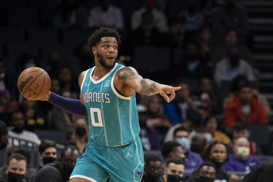 Charlotte Hornets forward Miles Bridges (0) brings the ball up court during the first half of an NBA basketball game against the Portland Trail Blazers, Sunday, Oct. 31, 2021, in Charlotte, N.C. (AP Photo/Matt Kelley)