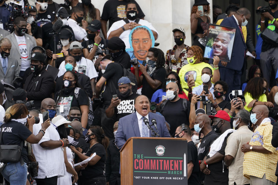 FILE - In this Aug. 28, 2020, file photo, Martin Luther King, III speaks at the March on Washington, Friday Aug. 28, 2020, at the Lincoln Memorial in Washington, on the 57th anniversary of the Rev. Martin Luther King Jr.'s "I Have A Dream" speech in Washington. A tough road lies ahead for Biden who will need to chart a path forward to unite a bitterly divided nation and address America’s fraught history of racism that manifested this year through the convergence of three national crises. (AP Photo/Susan Walsh, File)