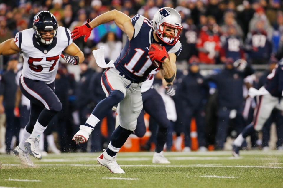 <p>Julian Edelman #11 of the New England Patriots runs the ball against the Houston Texans in the first half during the AFC Divisional Playoff Game at Gillette Stadium on January 14, 2017 in Foxboro, Massachusetts. (Photo by Jim Rogash/Getty Images) </p>