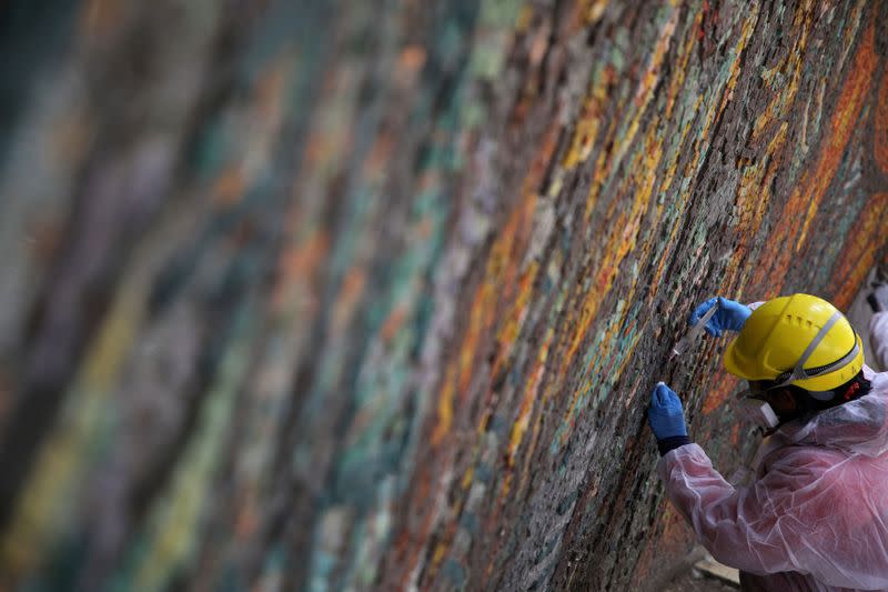 Restorer works on the mosaics inside the Buzludzha monument in Stara Planina mountain