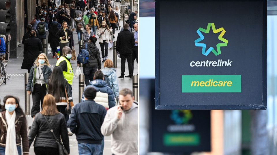 Centrelink sign. People walking.