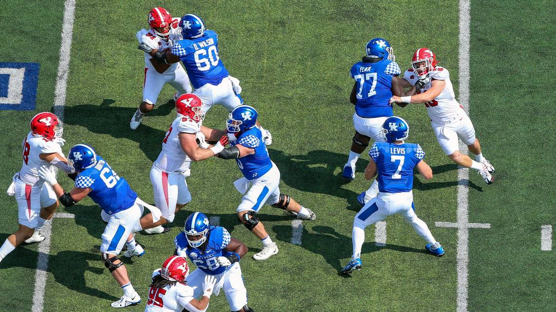 The starting UK offensive line — Jeremy Flax (77), Quintin Wilson (60), Eli Cox (75), Jager Burton (62) and Kenneth Horsey (68) — pass protects for quarterback Will Levis (7) during the team’s game against Youngstown State..