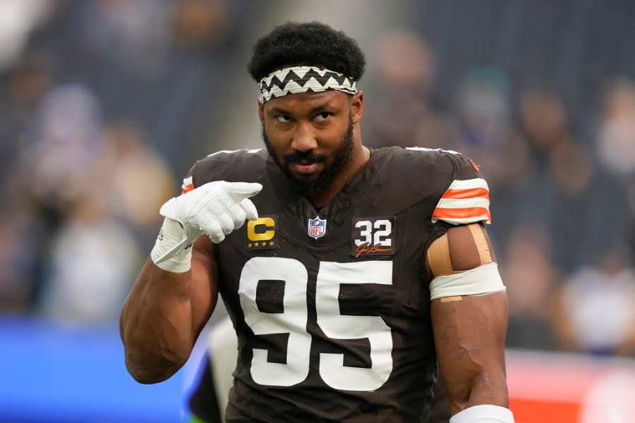 Cleveland Browns defensive end Myles Garrett gestures before an NFL football game against the Los Angeles Rams, Sunday, Dec. 3, 2023, in Inglewood, Calif. (AP Photo/Ryan Sun)