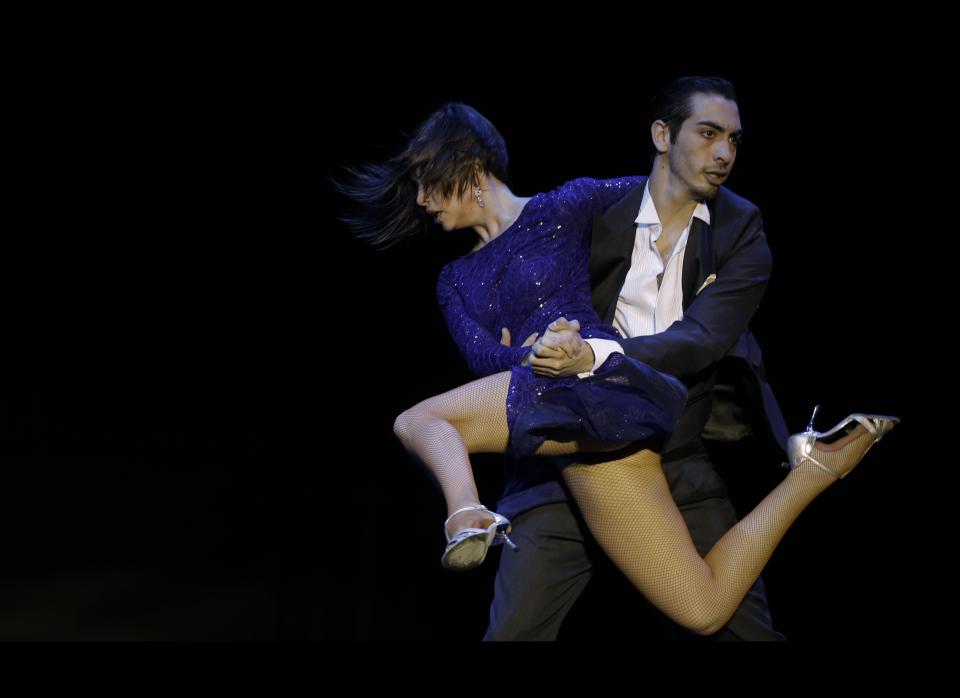 Argentina's Emmanuel Angel Casal and Yanina Lorena Muzyka compete during the 2012 Tango Dance World Cup stage finals in Buenos Aires on Aug. 28, 2012.&nbsp;