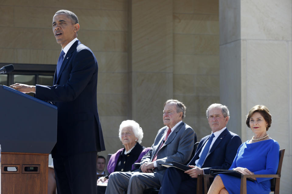 President Barack Obama speaks during the dedication of the George W. Bush presidential library on the campus of Southern Methodist University in Dallas, Thursday, April 25, 2013. Seated, from left are, former first lady Barbara Bush, former President George H.W. Bush, former President George W. Bush, and his wife, former first lady Laura Bush. (AP Photo/Charles Dharapak)