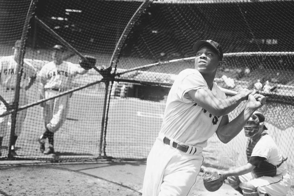 PHOTO: New York Giants' Willie Mays, takes a batting practice swing on June 24, 1954, in New York.  (John Lent/AP, FILE)