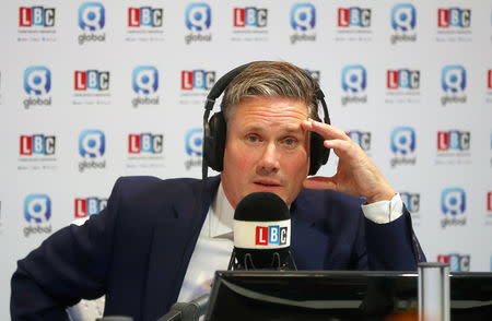 The Labour Party's Shadow Secretary of State for Departing the European Union Keir Starmer gives a radio interview at his party's conference in Liverpool, Britain, September 25, 2018. REUTERS/Hannah McKay