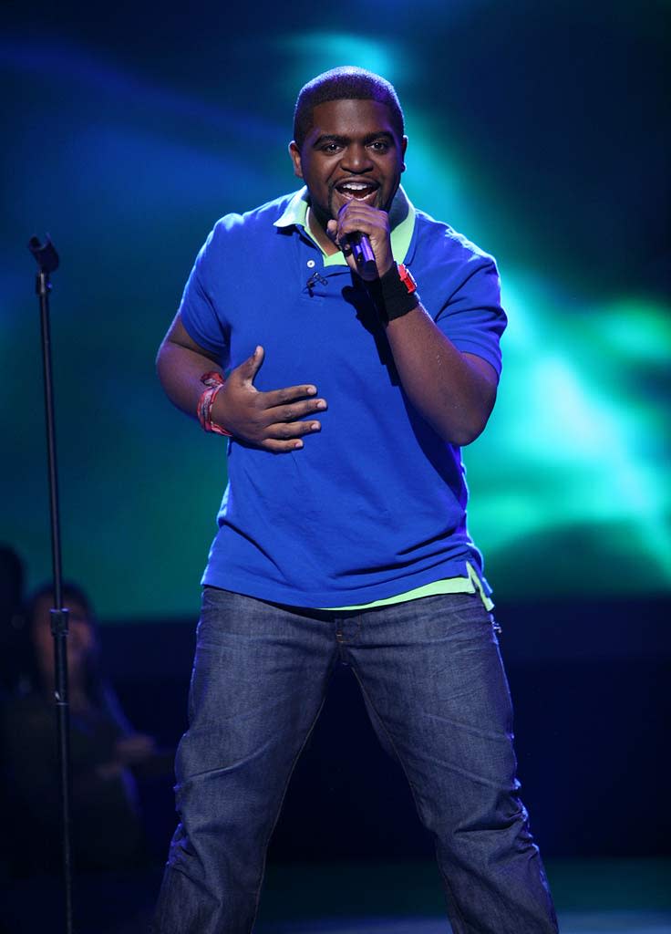 Chikezie performs as one of the top 20 contestants on the 7th season of American Idol.