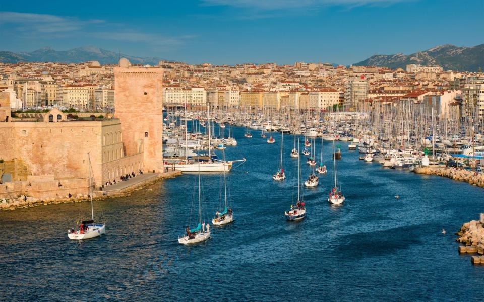 Yachts sailing into Marseille Old Port