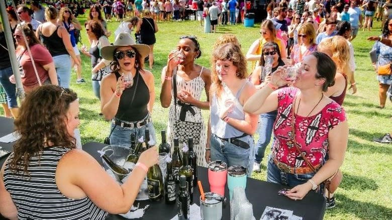 women drinking at wine festival