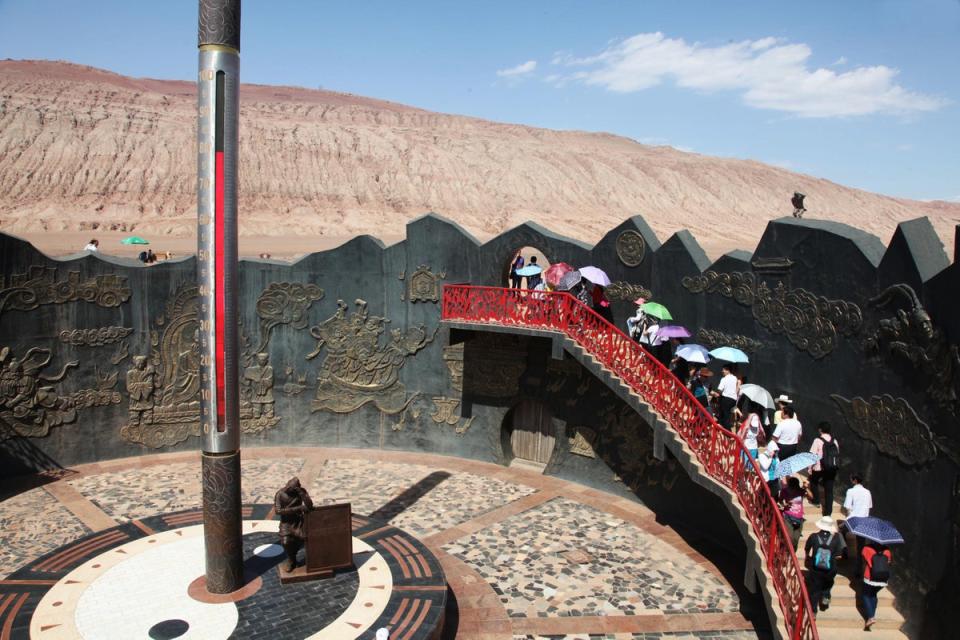 Thermometer displaying the land surface temperature reading of 78 degrees Celsius in the Flaming Mountains of Turpan, northwest China's Xinjiang region (AFP/Getty)