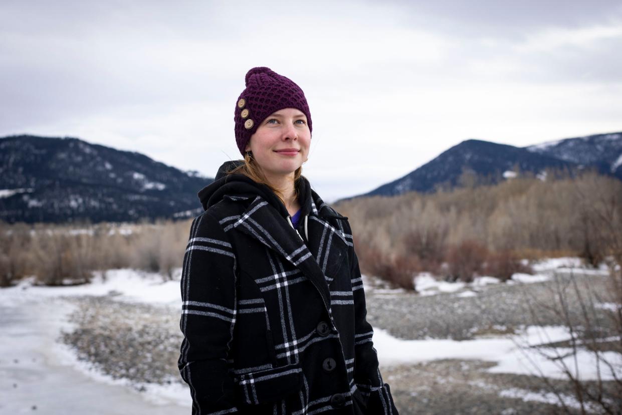 Eva Lighthiser poses for a portrait along the banks of the Yellowstone River at Sacajawea Park in Livingston, Mont. on Wednesday, Jan. 17, 2024. Lighthiser’s experience during the flooding of the Yellowstone River in June 2022 featured prominently in her testimony during Held v. Montana.