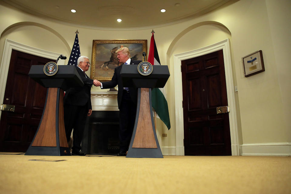 President Trump shakes hands with Palestinian President Abbas at the White House