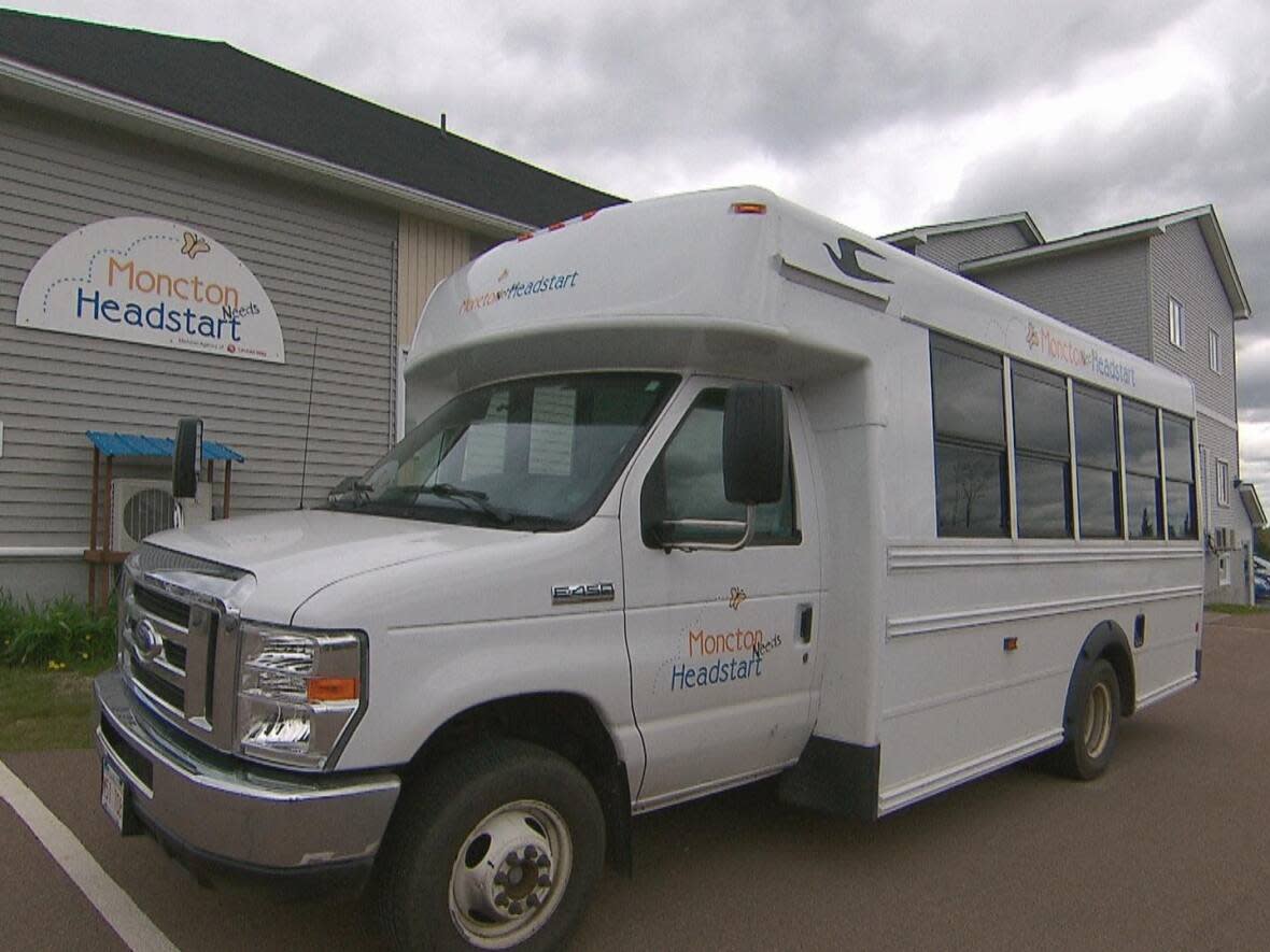 After the catalytic converter was stolen from one of Moncton Headstart's buses on Wednesday, the charity is struggling to get children and families to the centre for programming and healthy meals. (Gilles Landry/CBC - image credit)