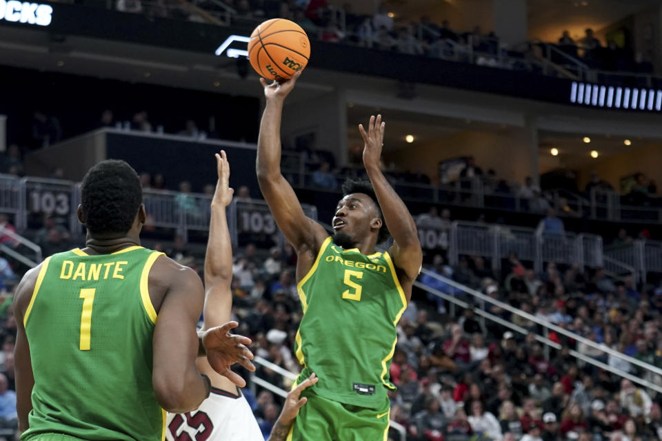 Oregon's Jermaine Couisnard (5) shoots during the second half of a first-round college basketball game in the NCAA Tournament against against South Carolina, Thursday, March 21, 2024, in Pittsburgh. (AP Photo/Matt Freed)