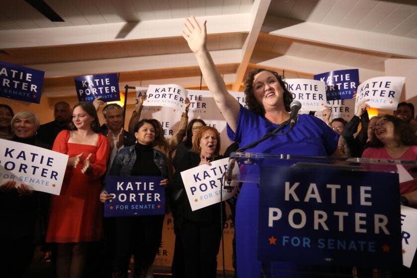 LONG BEACH, CA - MARCH 5, 2024 - - U.S. Representative Katie Porter applauds her daughter Betsy Hoffman, 12, off camera, while she introduces her mother to supporters at Porter's watch party at The Bungalow in Long Beach on March 5, 2024. (Genaro Molina/Los Angeles Times)