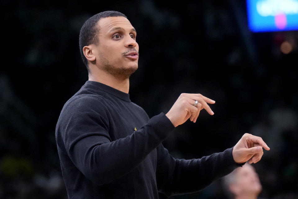 Boston Celtics coach Joe Mazzulla calls to players during the first half of an NBA basketball game against the Minnesota Timberwolves, Wednesday, Jan. 10, 2024, in Boston. (AP Photo/Charles Krupa)