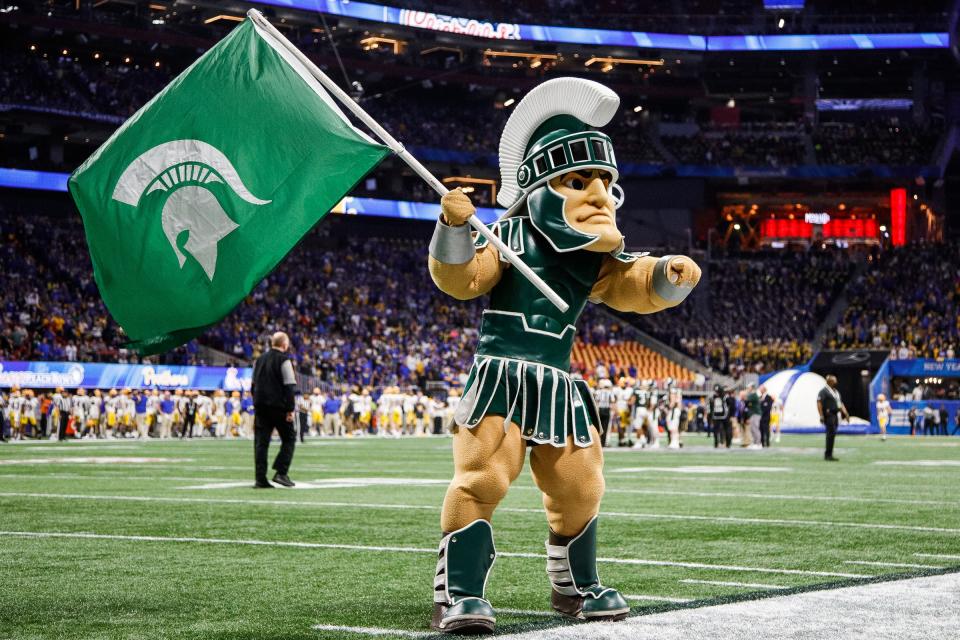 Sparty cheers for Michigan State before kickoff of the 31-21 win over Pittsburgh in the Peach Bowl at the Mercedes-Benz Stadium in Atlanta on Thursday, Dec. 30, 2021.