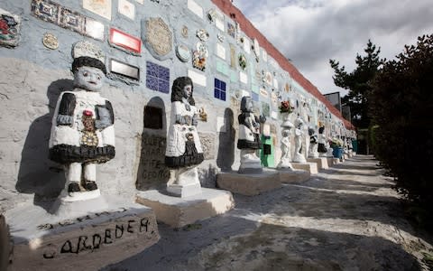 Every spare wall and square metre of Gerry's social housing and garden in Westbourne Park, west London, is covered with his handmade treasures. To this day, no one knows when he managed to build such vast statues.  - Credit: Jeff Gilbert&nbsp;/Jeff Gilbert&nbsp;