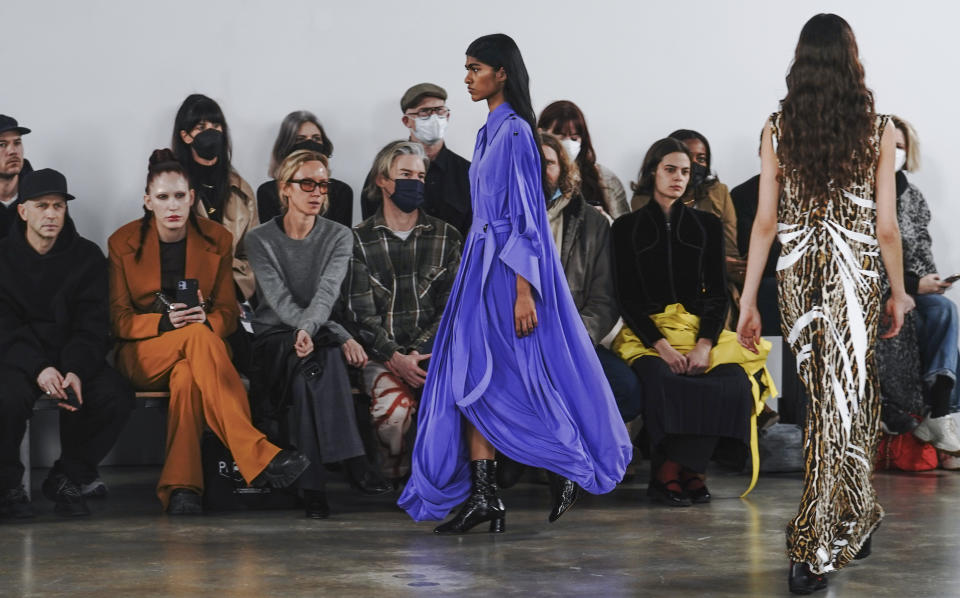 Fashion from Proenza Schouler collection is modeled during Fashion Week, Friday, Feb. 11, 2022 in New York. (AP Photo/Bebeto Matthews)