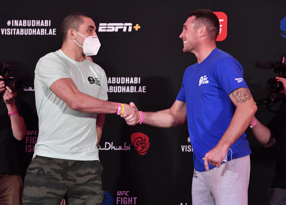 ABU DHABI, UNITED ARAB EMIRATES - JULY 24: (L-R) Opponents Robert Whittaker of New Zealand and Darren Till of England face off during the UFC Fight Night weigh-in inside Flash Forum on UFC Fight Island on July 24, 2020 in Yas Island, Abu Dhabi, United Arab Emirates. (Photo by Jeff Bottari/Zuffa LLC via Getty Images)