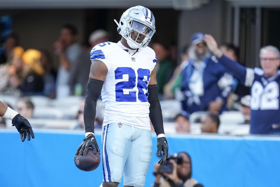 Dallas Cowboys cornerback DaRon Bland (26) celebrates his score in the end zone against the Carolina Panthers. Mandatory Credit: Jim Dedmon-USA TODAY Sports