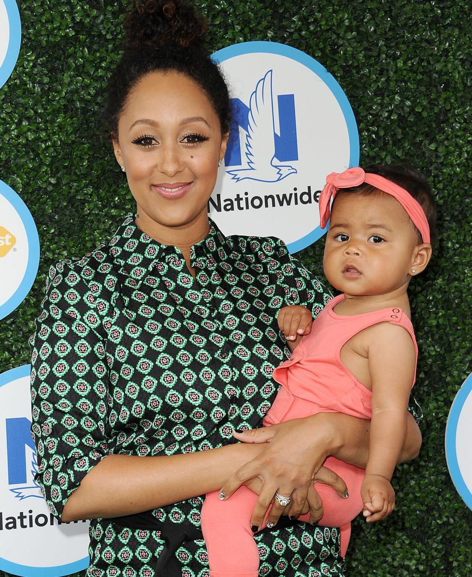 Tamera Mowry and daughter Ariah Talea Housley attend Safe Kids Day at Smashbox Studios on April 24, 2016 in Culver City, California