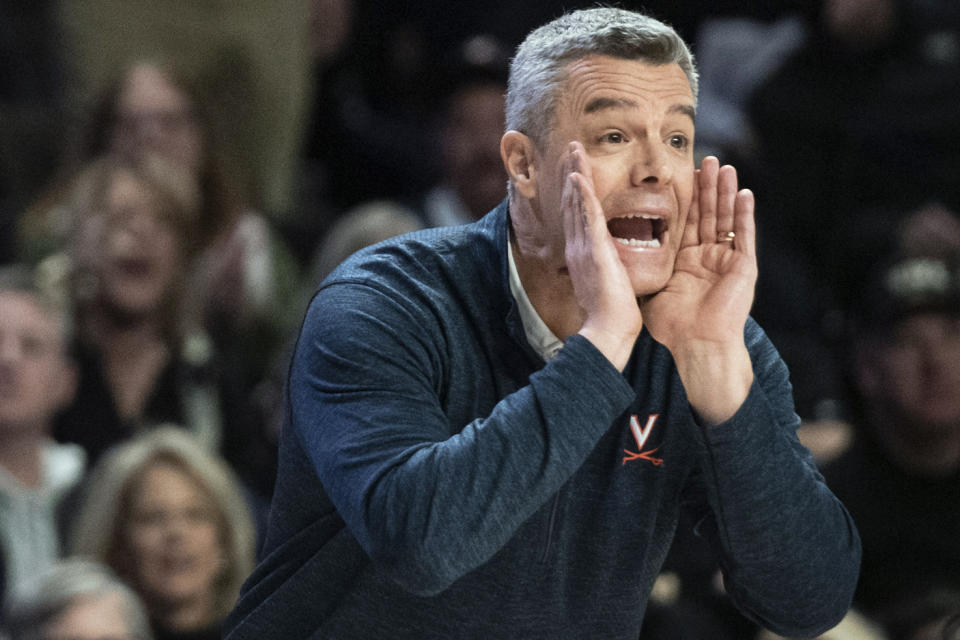 FILE - Virginia head coach Tony Bennett directs his team in the first half of an NCAA college basketball game against Wake Forest, Saturday, Jan. 13, 2024, at Joel Coliseum in Winston-Salem, N.C. Some numbers still identify Virginia as one of the elite teams in college basketball, especially on the defensive end — long their calling card under coach Tony Bennett. (Allison Lee Isley/The Winston-Salem Journal via AP, File)